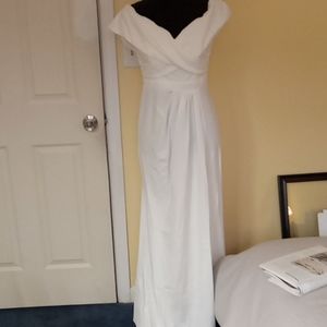 NWT Little Mistress London size US 8 stunning long white gown slit in front.